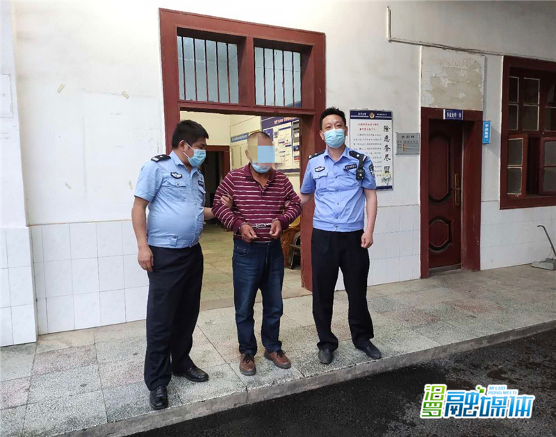 事故中队民警将命案逃犯押解回汨_副本.jpg